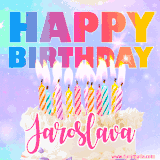 A vibrant animated name GIF with the words 'Happy Birthday Jaroslava' with colorful candles on a creamy cake. The background sparkles with pastel shades, adding a festive touch.