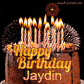 A rich chocolate cake topped with glowing birthday candles and surrounded by bright fireworks. The animated GIF displays the message 'Happy Birthday Jaydin' in golden text.