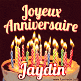 A Happy Birthday GIF in French featuring a festive birthday cake adorned with bright candles and the glowing text 'Joyeux Anniversaire Jaydin' in a cheerful style.