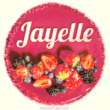 Beautifully decorated red velvet berry birthday cake with vibrant fruits and a glowing 'Jayelle' name, adding a touch of sweetness and sparkle.