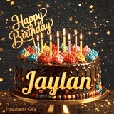 Burning birthday candles on top of a chocolate drip cake decorated with colorful icing dollops and sprinkles, personalized for Jaylan.