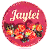 Beautifully decorated red velvet berry birthday cake with vibrant fruits and a glowing 'Jaylei' name, adding a touch of sweetness and sparkle.