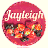 Beautifully decorated red velvet berry birthday cake with vibrant fruits and a glowing 'Jayleigh' name, adding a touch of sweetness and sparkle.