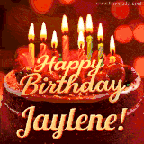 Beautifully decorated red velvet berry birthday cake with vibrant fruits and a glowing 'Jaylene' name, adding a touch of sweetness and sparkle.