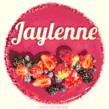 Beautifully decorated red velvet berry birthday cake with vibrant fruits and a glowing 'Jaylenne' name, adding a touch of sweetness and sparkle.