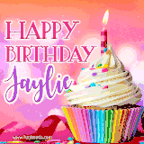 A vibrant birthday GIF featuring a rainbow-colored cupcake topped with white frosting, sprinkles, and a lit candle. The text reads 'Happy Birthday Jaylie' in bold pink and violet letters with white outline.