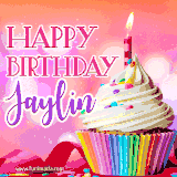 A vibrant birthday GIF featuring a rainbow-colored cupcake topped with white frosting, sprinkles, and a lit candle. The text reads 'Happy Birthday Jaylin' in bold pink and violet letters with white outline.
