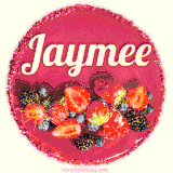 Beautifully decorated red velvet berry birthday cake with vibrant fruits and a glowing 'Jaymee' name, adding a touch of sweetness and sparkle.