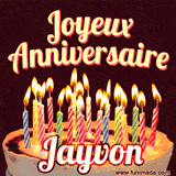 A Happy Birthday GIF in French featuring a festive birthday cake adorned with bright candles and the glowing text 'Joyeux Anniversaire Jayvon' in a cheerful style.