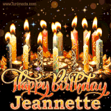 A glowing personalized birthday GIF with name Jeannette featuring lit candles with intricate designs, warm lighting, and the text 'Happy Birthday' in an elegant font.