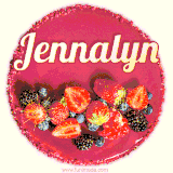 Beautifully decorated red velvet berry birthday cake with vibrant fruits and a glowing 'Jennalyn' name, adding a touch of sweetness and sparkle.