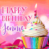 A vibrant birthday GIF featuring a rainbow-colored cupcake topped with white frosting, sprinkles, and a lit candle. The text reads 'Happy Birthday Jennie' in bold pink and violet letters with white outline.