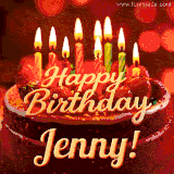 Beautifully decorated red velvet berry birthday cake with vibrant fruits and a glowing 'Jenny' name, adding a touch of sweetness and sparkle.