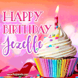 A vibrant birthday GIF featuring a rainbow-colored cupcake topped with white frosting, sprinkles, and a lit candle. The text reads 'Happy Birthday Jezelle' in bold pink and violet letters with white outline.