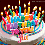 A colorful birthday cake topped with lit candles, with the words 'Happy Birthday Jia' in bold glowing letters on a burgundy background. Animated flames add a festive touch.