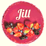 Beautifully decorated red velvet berry birthday cake with vibrant fruits and a glowing 'Jill' name, adding a touch of sweetness and sparkle.