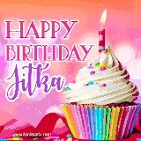 A vibrant birthday GIF featuring a rainbow-colored cupcake topped with white frosting, sprinkles, and a lit candle. The text reads 'Happy Birthday Jitka' in bold pink and violet letters with white outline.