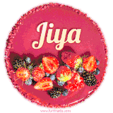 Beautifully decorated red velvet berry birthday cake with vibrant fruits and a glowing 'Jiya' name, adding a touch of sweetness and sparkle.