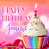 A vibrant birthday GIF featuring a rainbow-colored cupcake topped with white frosting, sprinkles, and a lit candle. The text reads 'Happy Birthday Joanie' in bold pink and violet letters with white outline.