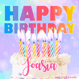 A vibrant animated name GIF with the words 'Happy Birthday Joasia' with colorful candles on a creamy cake. The background sparkles with pastel shades, adding a festive touch.