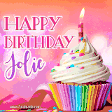 A vibrant birthday GIF featuring a rainbow-colored cupcake topped with white frosting, sprinkles, and a lit candle. The text reads 'Happy Birthday Jolie' in bold pink and violet letters with white outline.