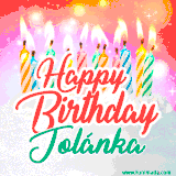 Bright birthday candles with rainbow flames on a cake, alongside the text 'Happy Birthday Jolánka' in vibrant script in this celebratory animated GIF.