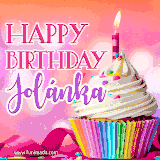 A vibrant birthday GIF featuring a rainbow-colored cupcake topped with white frosting, sprinkles, and a lit candle. The text reads 'Happy Birthday Jolánka' in bold pink and violet letters with white outline.