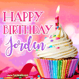 A vibrant birthday GIF featuring a rainbow-colored cupcake topped with white frosting, sprinkles, and a lit candle. The text reads 'Happy Birthday Jorden' in bold pink and violet letters with white outline.