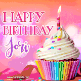 A vibrant birthday GIF featuring a rainbow-colored cupcake topped with white frosting, sprinkles, and a lit candle. The text reads 'Happy Birthday Jori' in bold pink and violet letters with white outline.