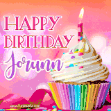 A vibrant birthday GIF featuring a rainbow-colored cupcake topped with white frosting, sprinkles, and a lit candle. The text reads 'Happy Birthday Jorunn' in bold pink and violet letters with white outline.