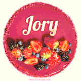 Beautifully decorated red velvet berry birthday cake with vibrant fruits and a glowing 'Jory' name, adding a touch of sweetness and sparkle.