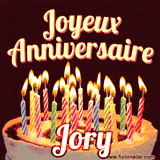 A Happy Birthday GIF in French featuring a festive birthday cake adorned with bright candles and the glowing text 'Joyeux Anniversaire Jory' in a cheerful style.