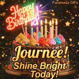 Festive chocolate cake GIF with the name Journee! written on the dark glaze under flickering candles.