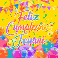 A bright and festive GIF with the text 'Feliz Cumpleaños Journi' in Spanish in colorful fonts, surrounded by confetti, balloons, and festive banners on a vibrant yellow background.