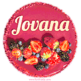 Beautifully decorated red velvet berry birthday cake with vibrant fruits and a glowing 'Jovana' name, adding a touch of sweetness and sparkle.
