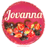Beautifully decorated red velvet berry birthday cake with vibrant fruits and a glowing 'Jovanna' name, adding a touch of sweetness and sparkle.
