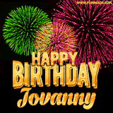 A captivating GIF with bursts of green, pink, and orange fireworks lighting up the night sky, accompanied by 'Happy Birthday Jovanny' in glowing golden text.