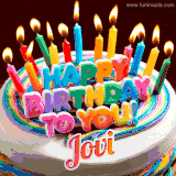 A colorful birthday cake topped with lit candles, with the words 'Happy Birthday Jovi' in bold glowing letters on a burgundy background. Animated flames add a festive touch.