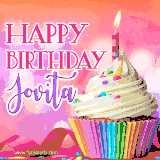A vibrant birthday GIF featuring a rainbow-colored cupcake topped with white frosting, sprinkles, and a lit candle. The text reads 'Happy Birthday Jovita' in bold pink and violet letters with white outline.