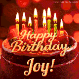 Beautifully decorated red velvet berry birthday cake with vibrant fruits and a glowing 'Joy' name, adding a touch of sweetness and sparkle.