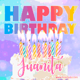 A vibrant animated name GIF with the words 'Happy Birthday Juanita' with colorful candles on a creamy cake. The background sparkles with pastel shades, adding a festive touch.