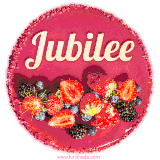 Beautifully decorated red velvet berry birthday cake with vibrant fruits and a glowing 'Jubilee' name, adding a touch of sweetness and sparkle.