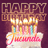 A colorful birthday cake topped with lit candles, with the words 'Happy Birthday Jucunda' in bold glowing letters on a burgundy background. Animated flames add a festive touch.