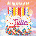 Personalized for Julie elegant birthday cake adorned with rainbow sprinkles, colorful candles and glitter