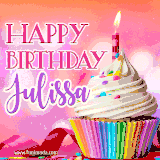 A vibrant birthday GIF featuring a rainbow-colored cupcake topped with white frosting, sprinkles, and a lit candle. The text reads 'Happy Birthday Julissa' in bold pink and violet letters with white outline.