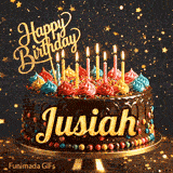 A chocolate birthday cake with colorful candies at the base and lit candles on top, featured on an animated card for Jusiah.