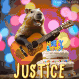 Animated birthday GIF showing a capybara playing guitar and singing beside a birthday cake with the name Justice in large letters and colorful bokeh lights in the background.