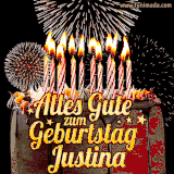 A chocolate birthday cake with glowing candles, the German text 'Alles Gute zum Geburtstag Justina,' and vibrant fireworks lighting up the background in an animated GIF.