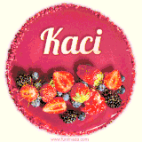Beautifully decorated red velvet berry birthday cake with vibrant fruits and a glowing 'Kaci' name, adding a touch of sweetness and sparkle.