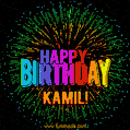 A colorful animated GIF featuring the text 'Happy Birthday Kamil!' in rainbow colors with a dynamic iridescent firework display in the background.